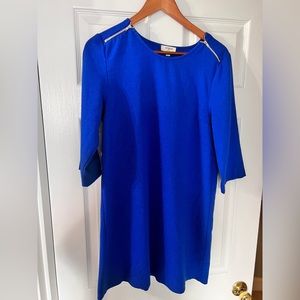Royal Blue Shift Dress with pleated and zipper details.